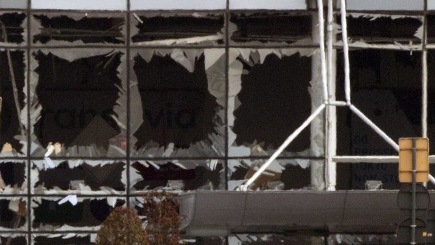 Shattered windows at Zaventem airport in Brussels after a bomb blast on Tuesday.