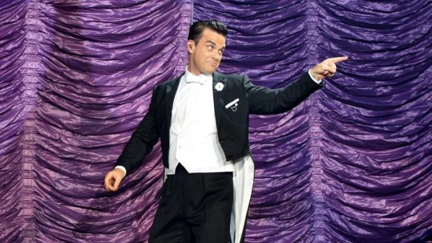Robbie Williams' charisma makes him a joy to watch. 