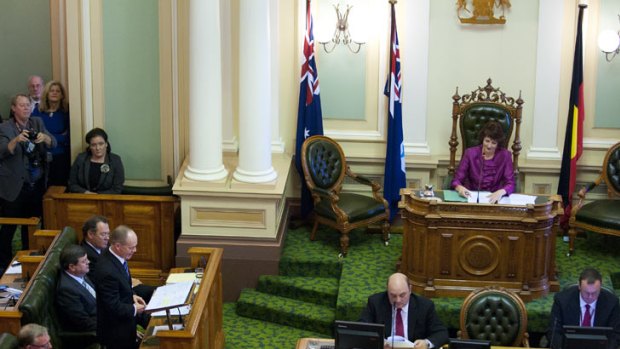 Premier Campbell Newman addresses Parliament as new speaker Fiona Simpson looks on.