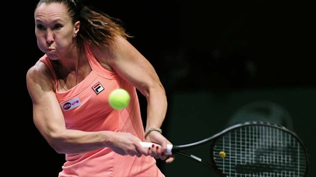 Fighter: Jelena Jankovic belts a return against Li Na at the WTA Championships in Istanbul.