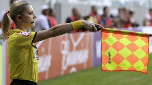 Brazil's referee assistant Fernanda Colombo Uliana makes an offside call.
