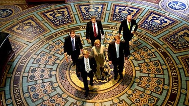 Ted Baillieu (front right) leaves a Coalition cabinet meeting yesterday flanked by colleagues.