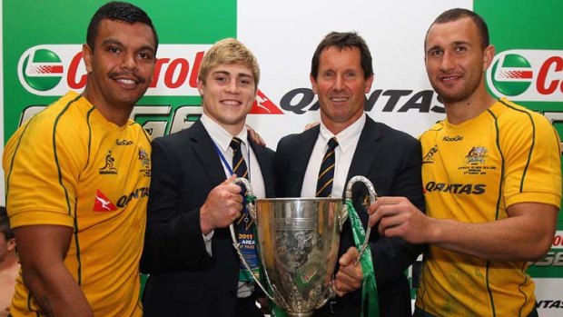 Stars in the making ...  Kurtley Beale, James O'Connor and Quade Cooper with coach Robbie Deans.