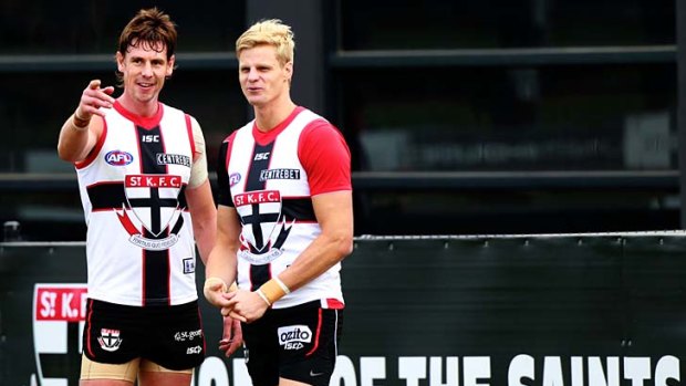 Tale of two homes: Justin Koschitzke (left) and Nick Riewoldt at a St Kilda training session at Seaford.