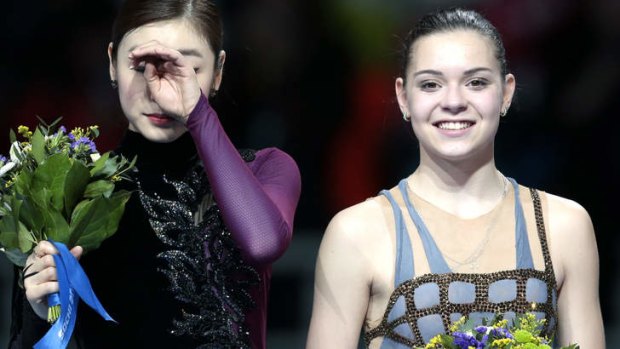 Controversy on the ice: Adelina Sotnikova, right, and Kim Yu-Na.