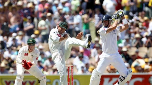 Take that ... England's firebrand Kevin Pietersen smashes another ball as Australian skipper Ricky Ponting takes evasive action at the Adelaide Oval yesterday.