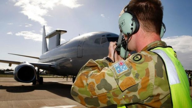 Ground crew prepare an RAAF E-7A Wedgetail Airborne Early Warning and Control aircraft.