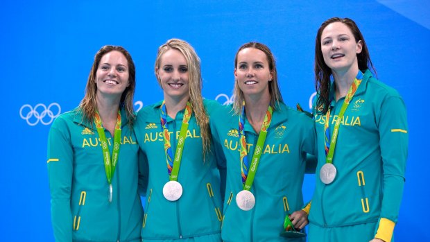 Top effort: Silver medalists Emily Seebohm, Taylor McKeown, Emma McKeon and Cate Campbell on the podium during the medal ceremony for the 4x100m medley relay final.