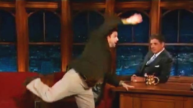 Jason Alexander delivers a leg break on the Late Late Show.