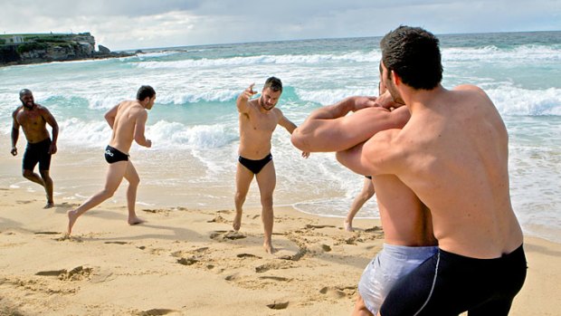 Beau knows Coogee &#8230; Wests Tigers winger Beau Ryan, centre, entertains teammates yesterday.