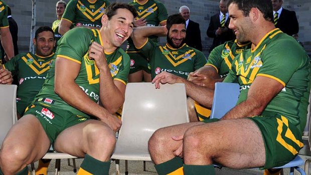 All smiles: Melbourne Storm's Billy Slater (left) and Cameron Smith in Canberra preparing for Friday night's Test.