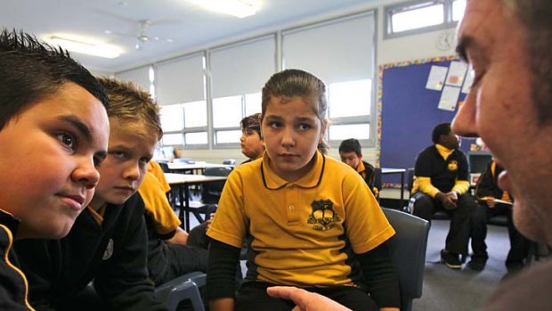 Students attend an ethics class at a primary school in Sydney. Upper House MP Fred Nile is pushing to have the classes, which provide an alternative to religious instruction, removed from public schools.