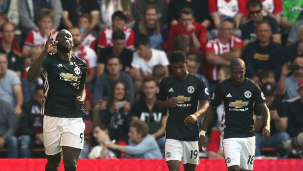 Lethal weapon: Lukaku celebrates scoring Manchester United's only goal against Southampton.