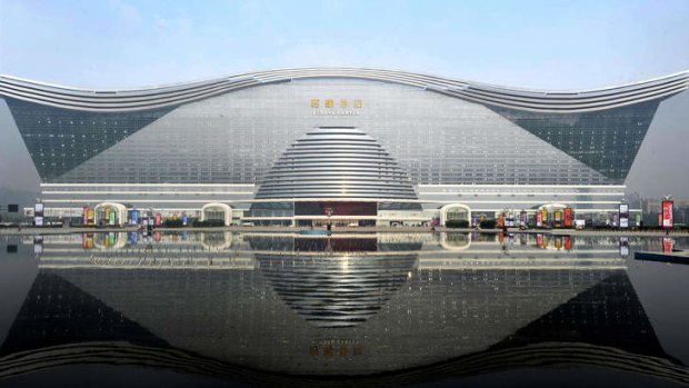 The "New Century Global Centre" building in Chengdu.  The centre, claimed by Chinese officials to be "the world's largest standalone structure", measures 500 metres in length and 400 metres in width, with 1.7 million square metres of floor space - big enough to hold 20 Sydney Opera Houses.
