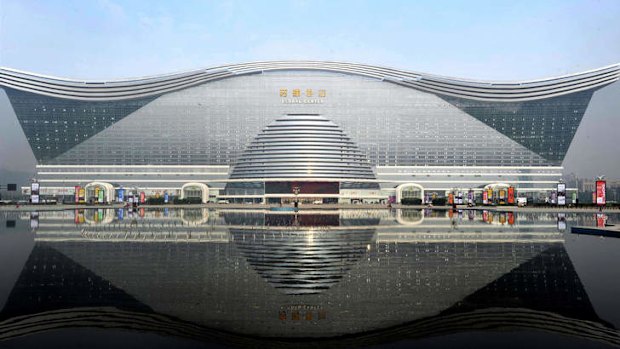 The "New Century Global Centre" building in Chengdu.  The centre, claimed by Chinese officials to be "the world's largest standalone structure", measures 500 metres in length and 400 metres in width, with 1.7 million square metres of floor space - big enough to hold 20 Sydney Opera Houses.