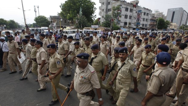 Indian policemen on patrol.