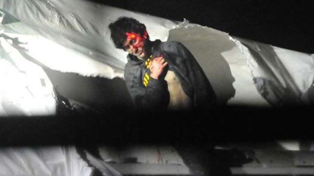 Covered in blood: Dzhokhar Tsarnaev before his arrest.