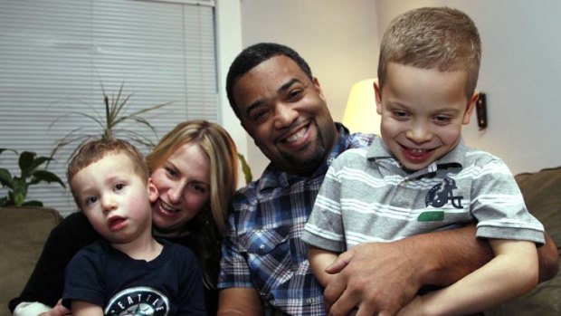 New lease on life ... Damon Brown with his wife, Bethany, and sons Theo, 3, left, and Julian, 5, at their home in Seattle.