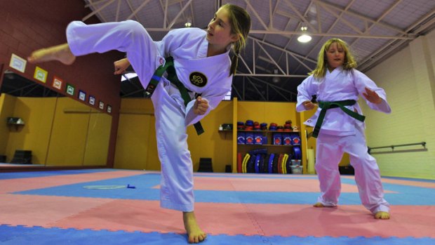 Battistello Karate students Sienna Battistello and Benni Barnet-Holmes train at the dojo in Malvern East.