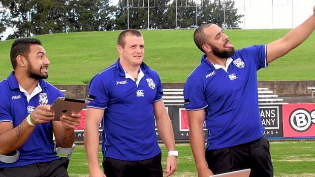 United kennel: Krisnan Inu, Josh Morris and Sam Kasiano during filming of an ad last week.
