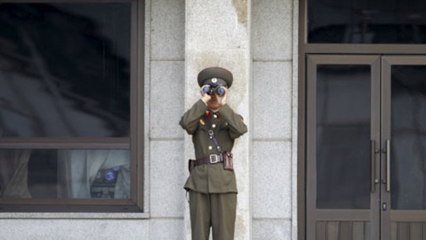 A North Korean soldier at the truce village of Panmunjom in the demilitarised zone seperating North and South Korea.