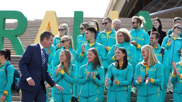 Pride: Olympic athletes are welcomed home by NSW Premier Mike Baird.