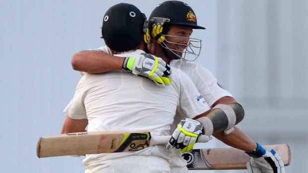 Batting bowlers: Ryan Harris (back) and Ben Hilfenhaus seal victory in the  first Test.