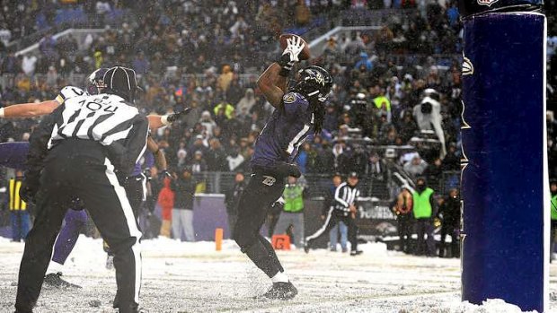 Snow trouble: Wide receiver Marlon Brown of the Baltimore Ravens makes the winning catch against the Minnesota Vikings.