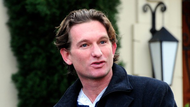 Suspended: Essendon coach James Hird outside his Toorak home on Wednesday.