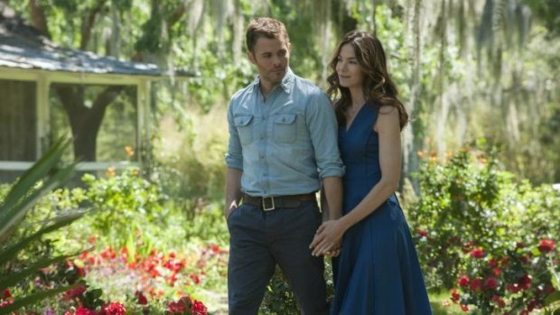 Love among the roses: James Marsden and Michelle Monaghan in <i>The Best of Me</i>, the latest big-screen adaptation of a Nicholas Sparks novel. 