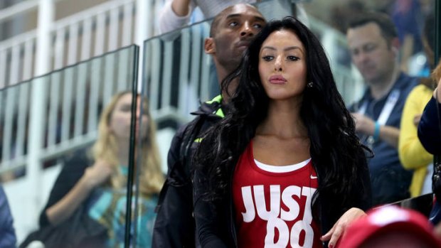 Kobe Bryant and his wife Vanessa at a swimming final.
