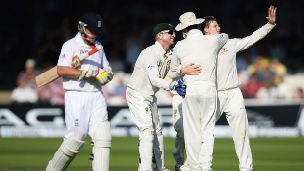 Steve Smith celebrates the wicket of century-maker Ian Bell.