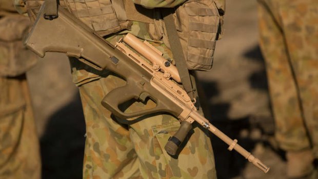 A small group of Australian troops have been sent into Iraq to help protect Australian embassy staff.