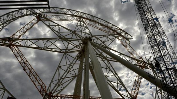 The Southern Star ferris wheel at Harbour Town was stripped down and is being rebuilt piece by piece.