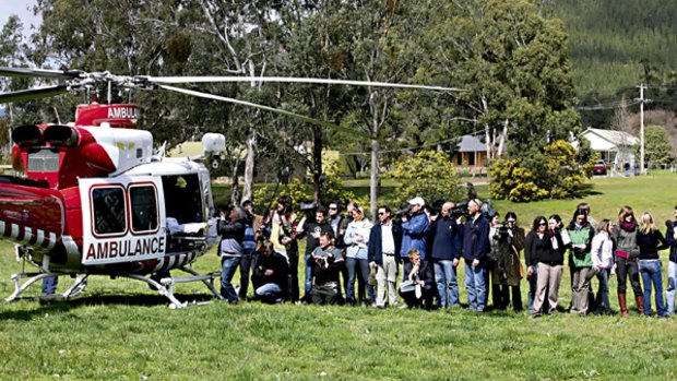 Bright ending ... after 2½ days on the icy edges of Mount Feathertop in Victoria, Water Minister Tim Holding was winched to safety yesterday.