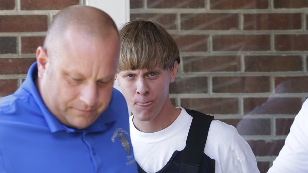 Dylann Roof, right, was allowed to buy a gun used to slaughter nine churchgoers in South Carolina in 2015. 
