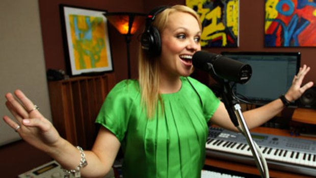 Emma Cowan of Swan View sings in a recording studio in New Jersey as she records a song about her experience aboard flight 1549 that landed in the Hudson river.