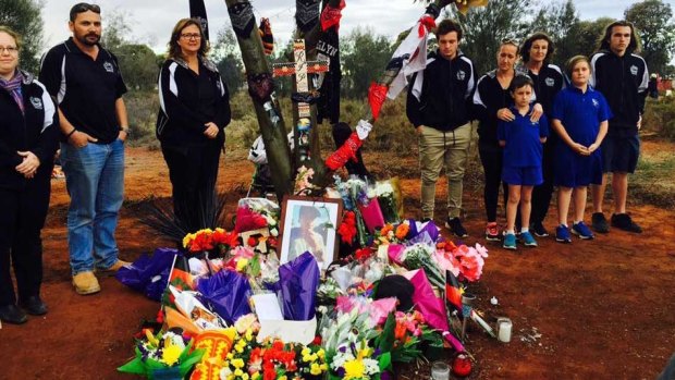Members of the Kalgoorlie City Football club pay their respects to Elijah Doughty.