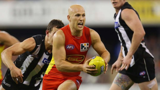 Give him a hug: Gary Ablett is a large part of the fast-improving fortunes of Gold Coast.