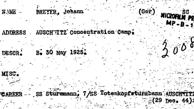 A copy of a World War II-era record of Johann "Hans" Breyer’s employment as an Auschwitz camp guard. <i>Photo: AP</i>