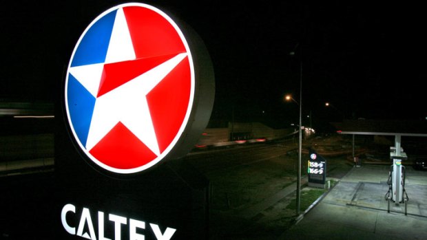 Caltex writes down value of two key refineries.