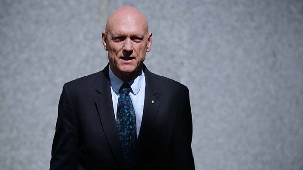 Minister for School Education, Early Childhood and Youth, Peter Garrett, speaks to the media during a doorstop interview at Parliament House.
