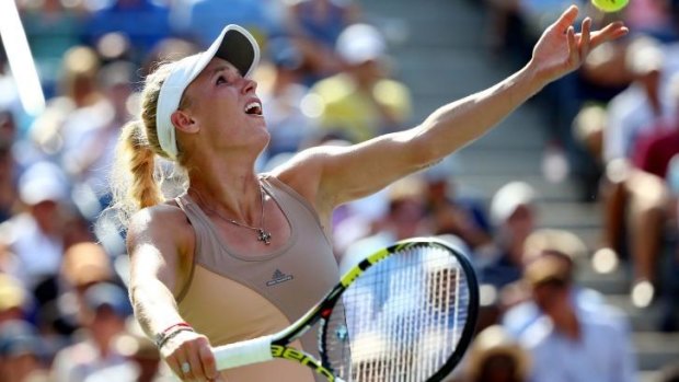 Caroline Wozniacki was forced to practice her serve while waiting for Peng Shuai to return to the court.