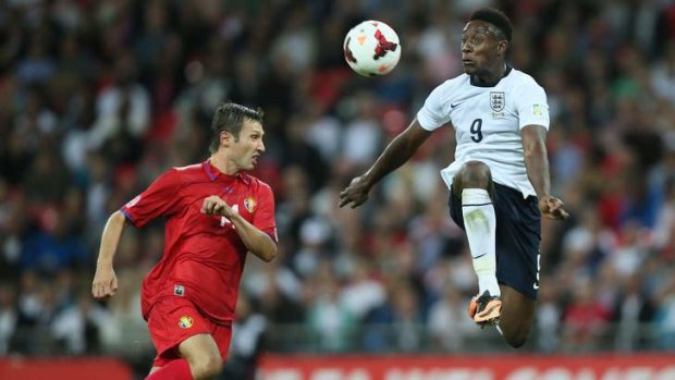The air up there: England's Danny Welbeck jumps high as he vies for the ball with Moldova's Vitalie Bordian during the World Cup qualifier group H soccer match between England and Moldova at Wembley Stadium in London.