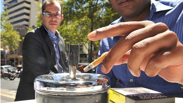 No butts: Councillor Richard Foster (left) wants to ban smoking in all public places in Melbourne.