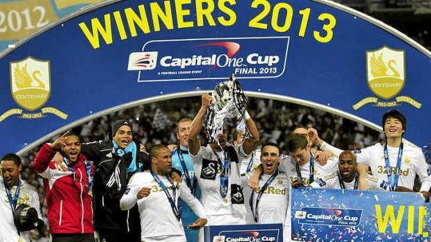 Swansea City celebrate their League Cup victory.