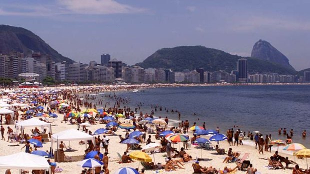 Australian Mark Nicholas Johnson faces charges after parachuting from the roof of a hotel on to Rio's Copacabana beach.