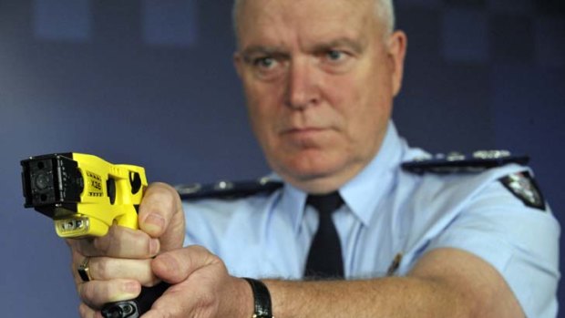 Deputy Commissioner Kieran Walshe with a Taser that has been used by police in Bendigo and Morwell since last June.