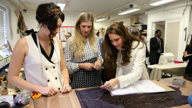 The Duchess of Cambridge inspects costumes still in production for Downton Abbey. 