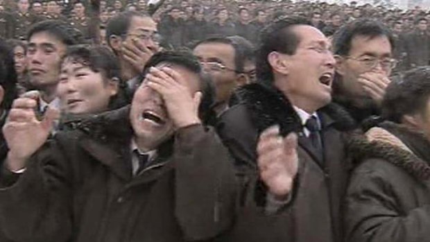 A nation in morning ... a North Korean television image of grief-stricken citizens in Pyongyang yesterday. Even the skies were "grieving" for Kim, state media said.